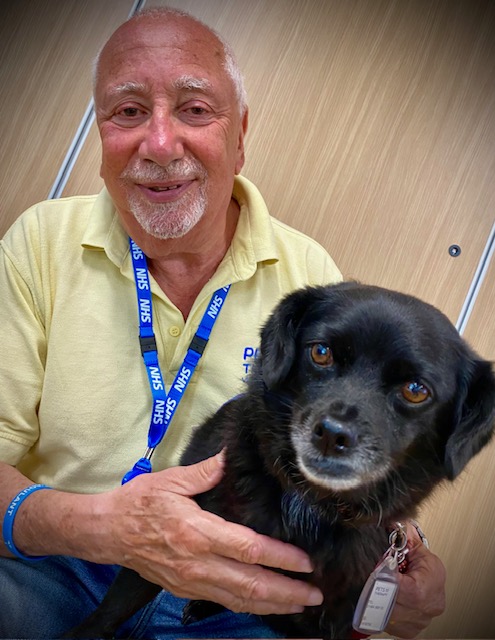 Man holding a dog